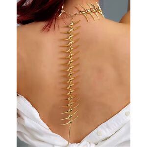 Avant-Garde Gold Spine Necklace – Sculptural Spike Choker Runway Statement